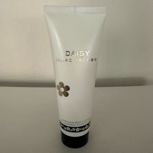 Marc Jacobs Daisy Lotion. Opened to smell but never used. 2.5 FL Oz.
